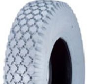 a light grey tyre with blocky tread pattern in size 3.00-4 260x85 for wheelchair or mobility scooter